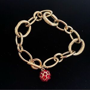 Red rhinestone gold tone toggle bracelet 7”